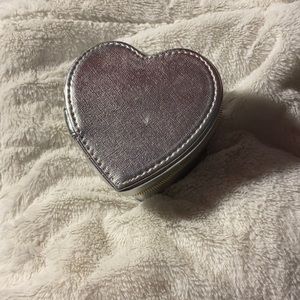 Silver heart shaped storage